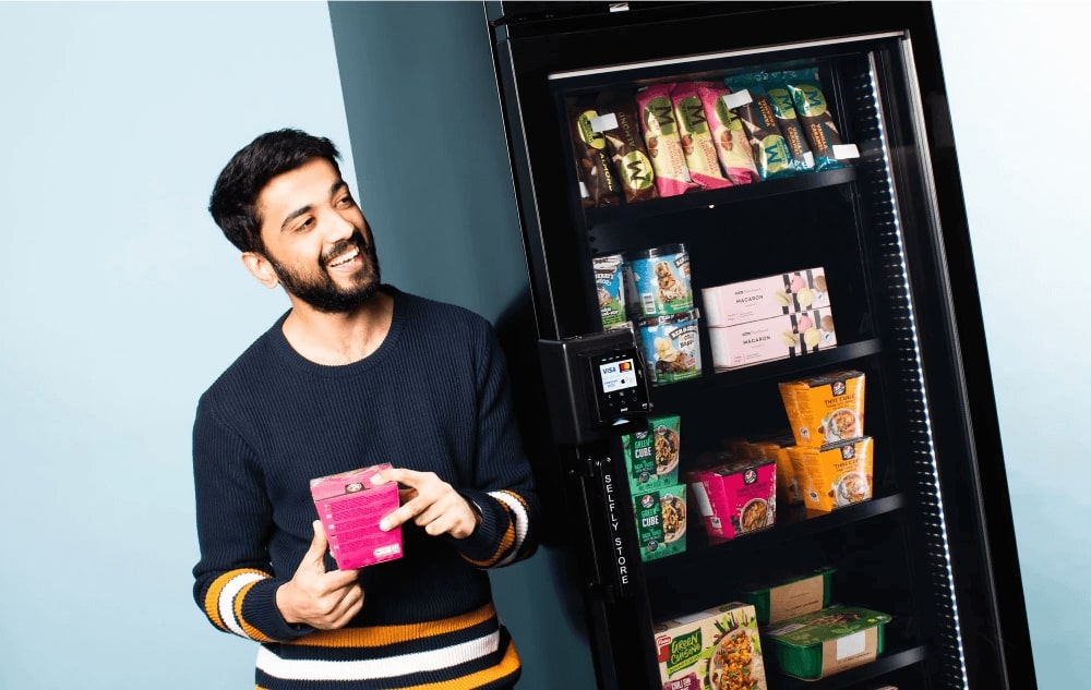 Person shopping from from Selfly Stores smart vending machine