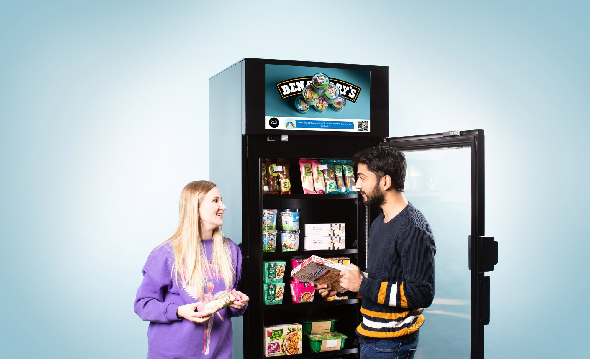 Selfly Freezer and people standing next to it